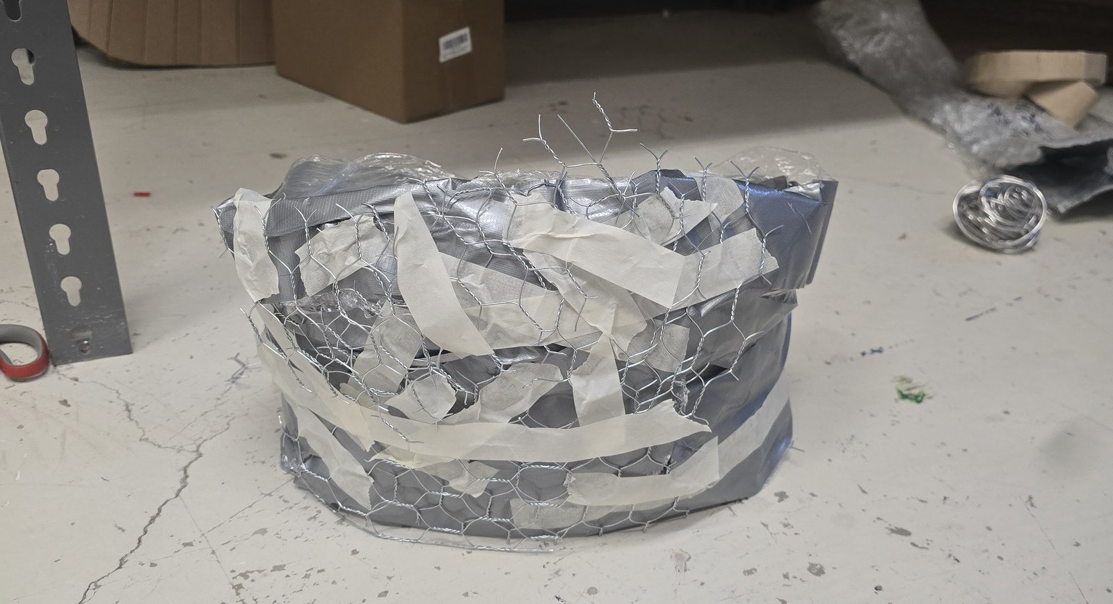 Corset structure built from chicken wire, plastic wrap, and duct tape