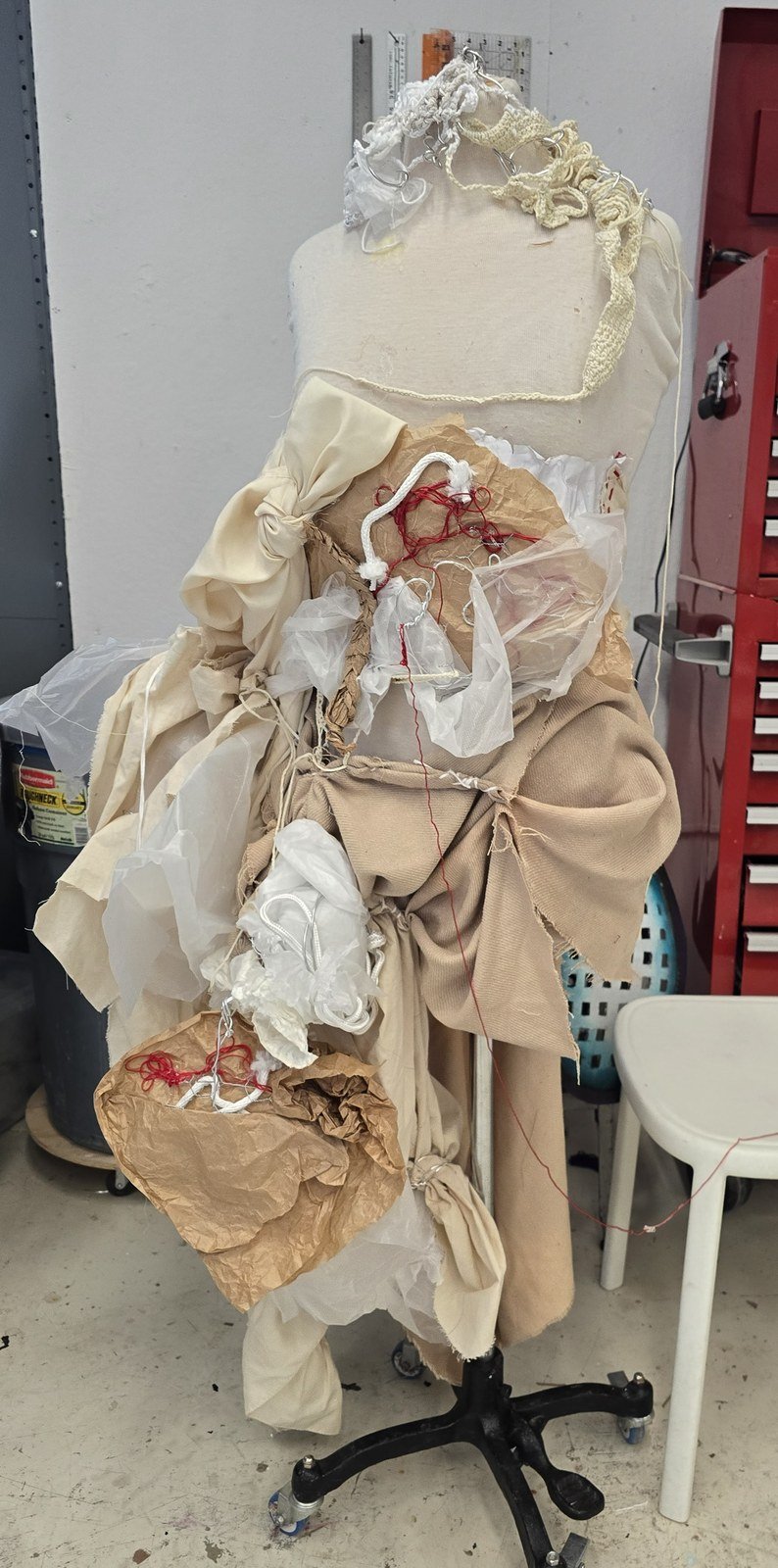 The assembled sculpture dress on a dress form